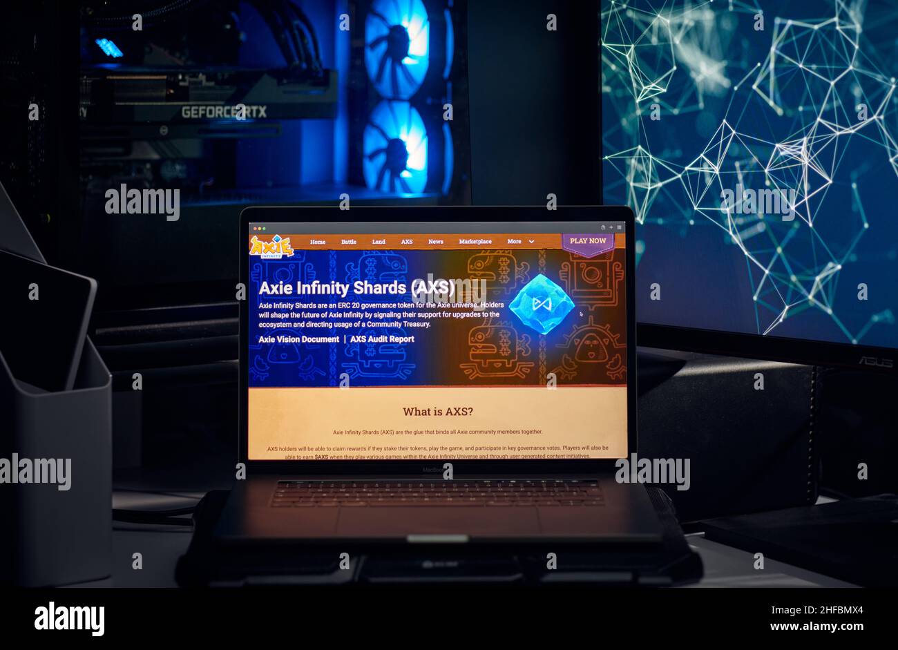 Milan, Italy - January 11, 2022: axie infinity - AXS website's hp seen on a laptop screen. axie infinity, AXS coin logo visible. Cryptocurrency, defi, Stock Photo