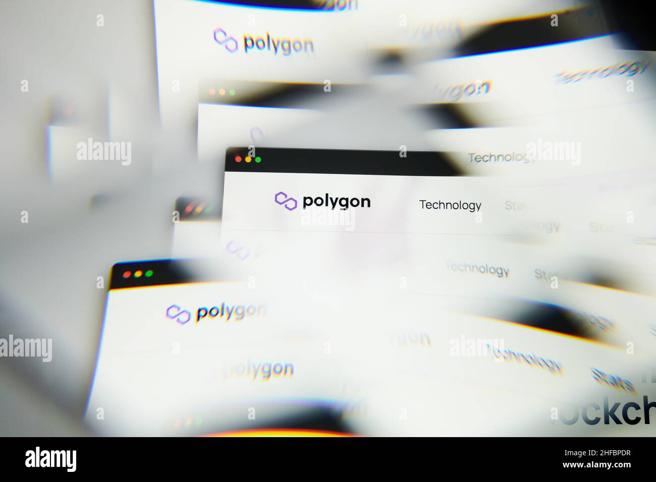 Milan, Italy - January 11, 2022: polygon - MATIC logo on laptop screen seen through an optical prism. Dynamic and unique image form polygon, MATIC coi Stock Photo