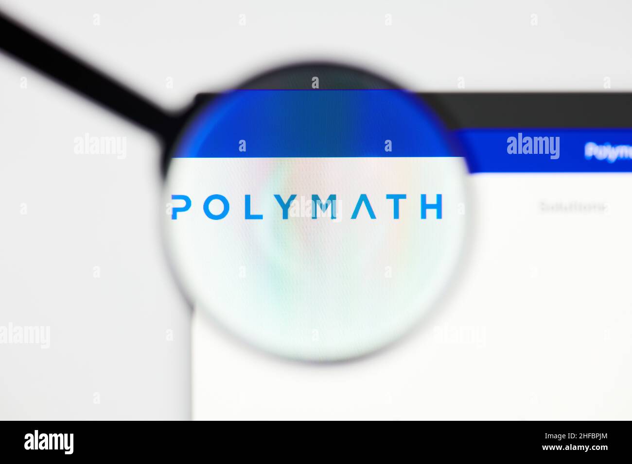 Milan, Italy - January 11, 2022: polymath - POLY website's hp.  polymath, POLY coin logo visible through a loope. Defi, ntf, cryptocurrency concepts i Stock Photo