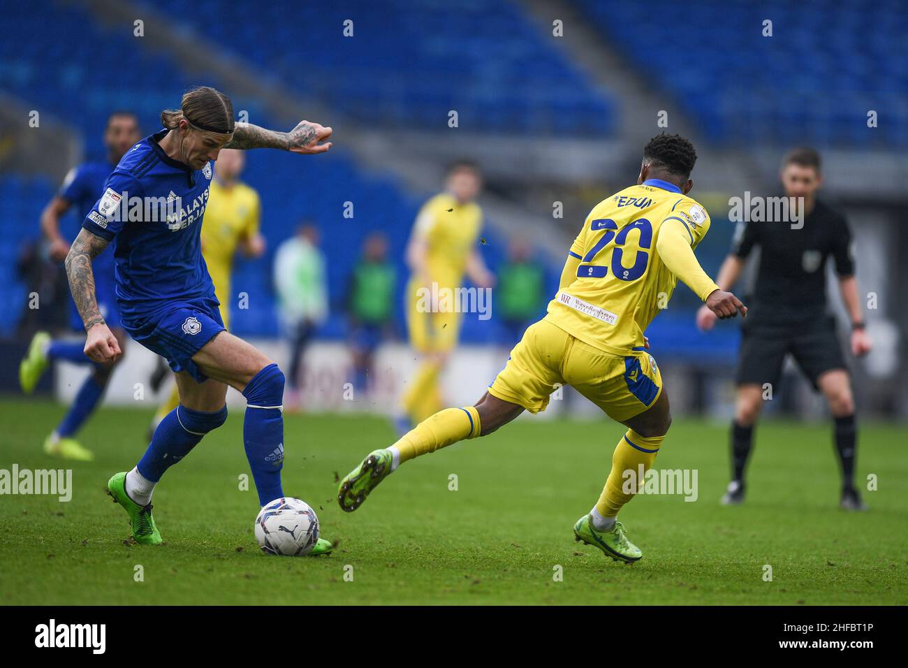 John Buckley #21 of Blackburn Rovers Under pressure fromAndy Rinomhota #35  of Cardiff City during the Sky Bet Championship match Cardiff City vs  Blackburn Rovers at Cardiff City Stadium, Cardiff, United Kingdom