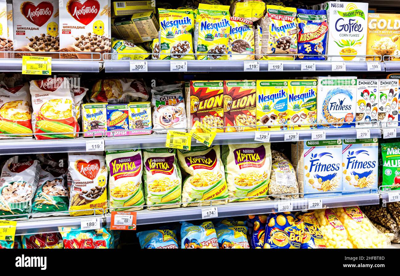 Samara, Russia - October 16, 2021: Various dry breakfasts and muesli in assortment on the store shelf Stock Photo
