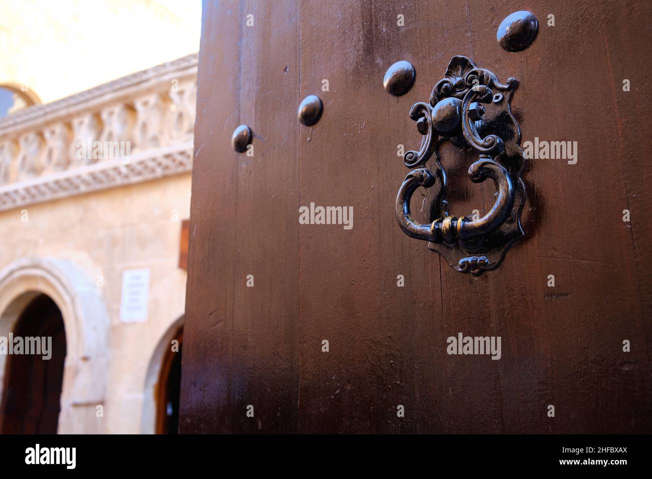 Wooden gates with knocker Stock Photo