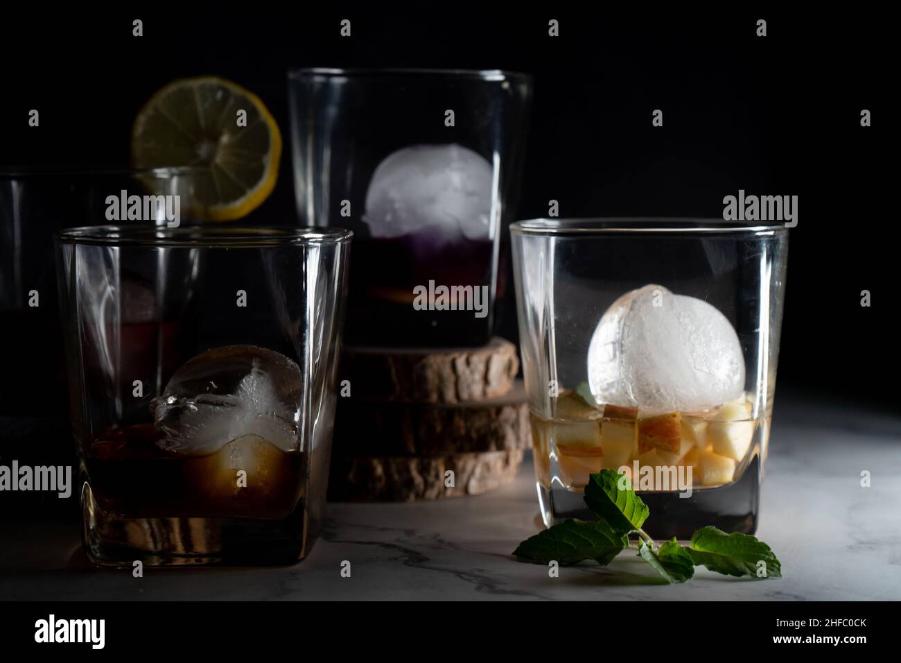 Whiskey with an Ice Ball in a Glass Stock Photo - Image of brandy