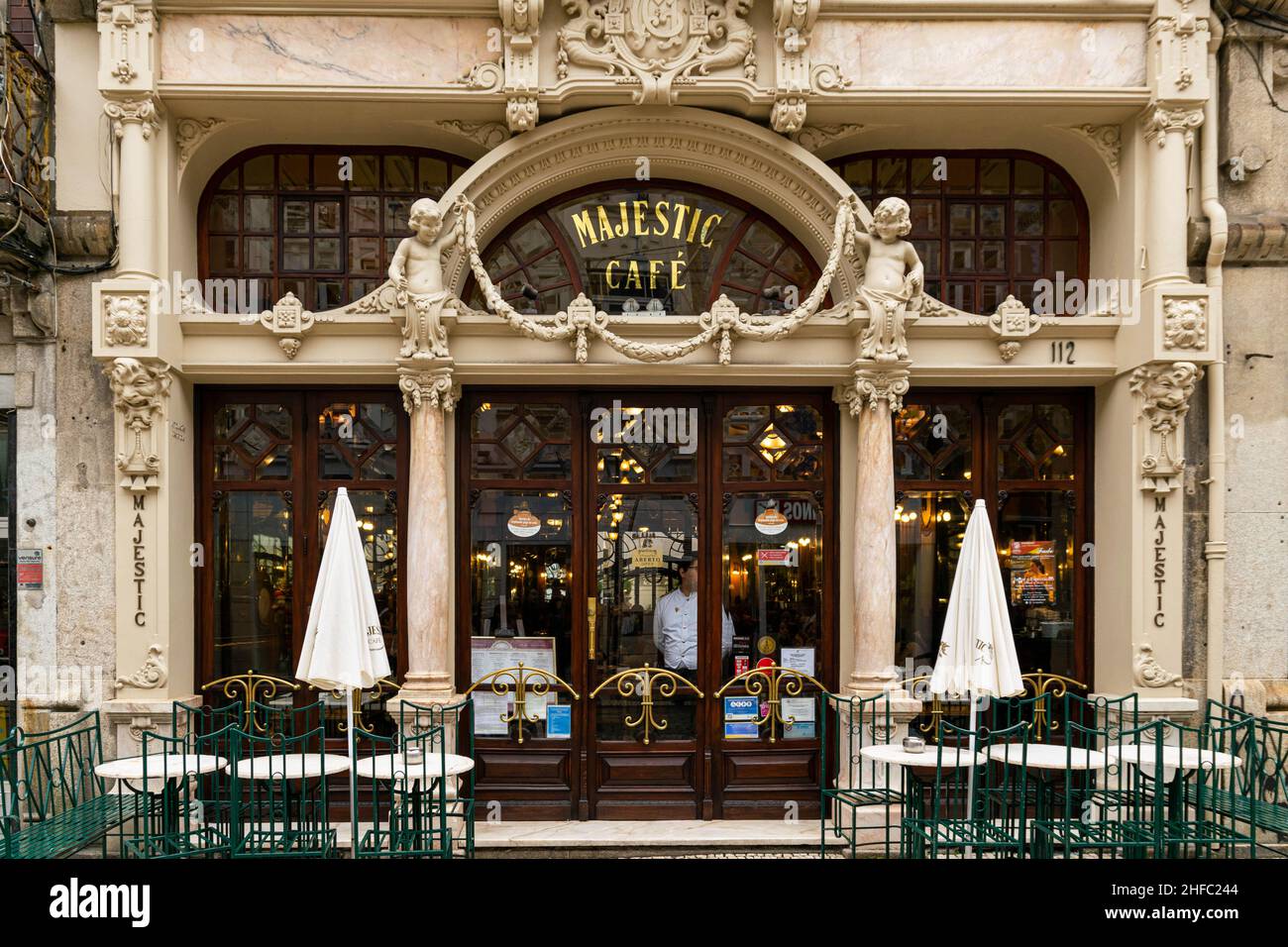 Porto, Portugal - 19 Nov 2020: The popular and expensive Majestic Café in city centre Porto. Very popular, very exclusive. Inside features ornate wood Stock Photo