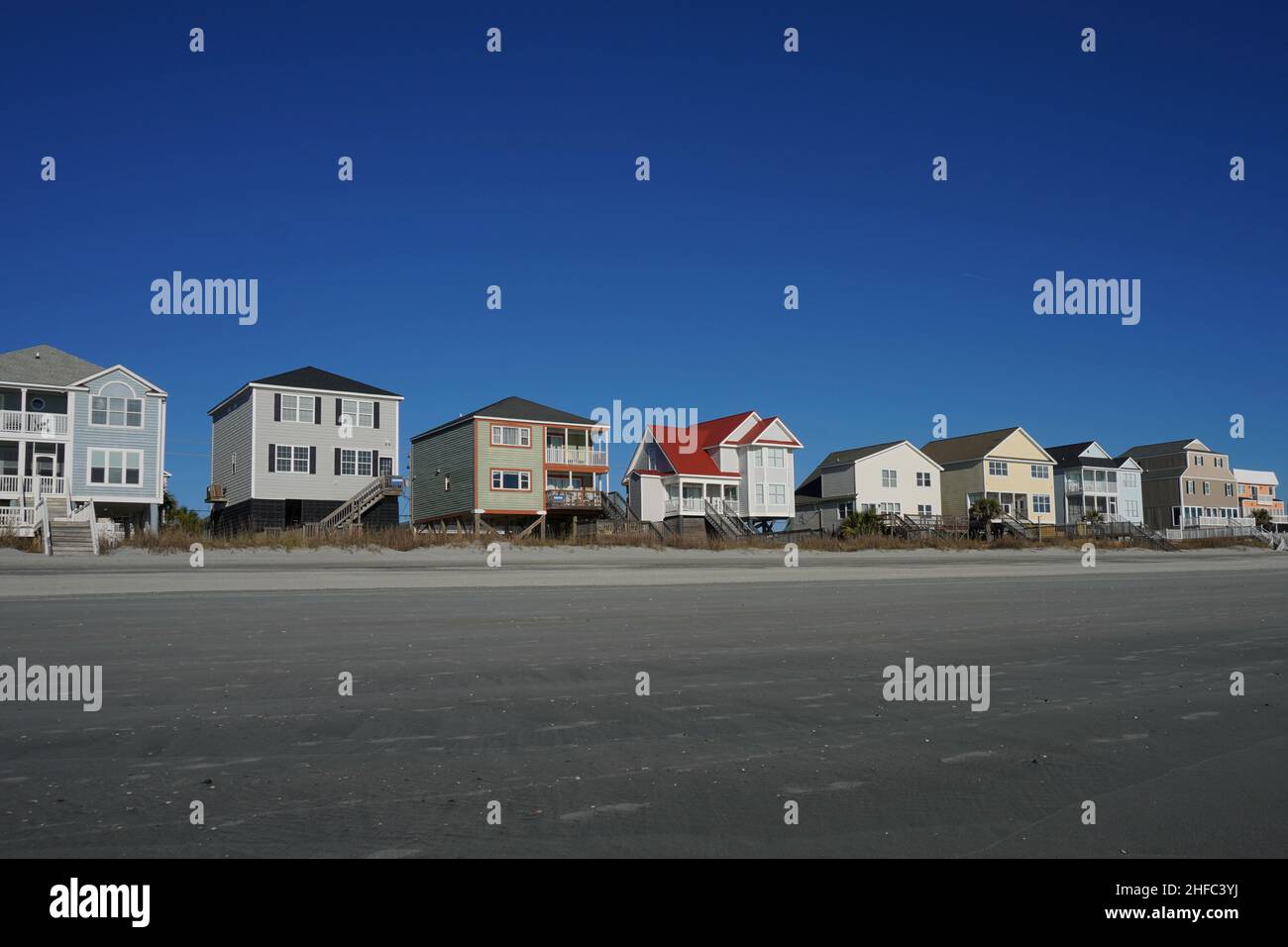 Colorful Beach Houses in a Row on the South Carolina Coast Stock Photo