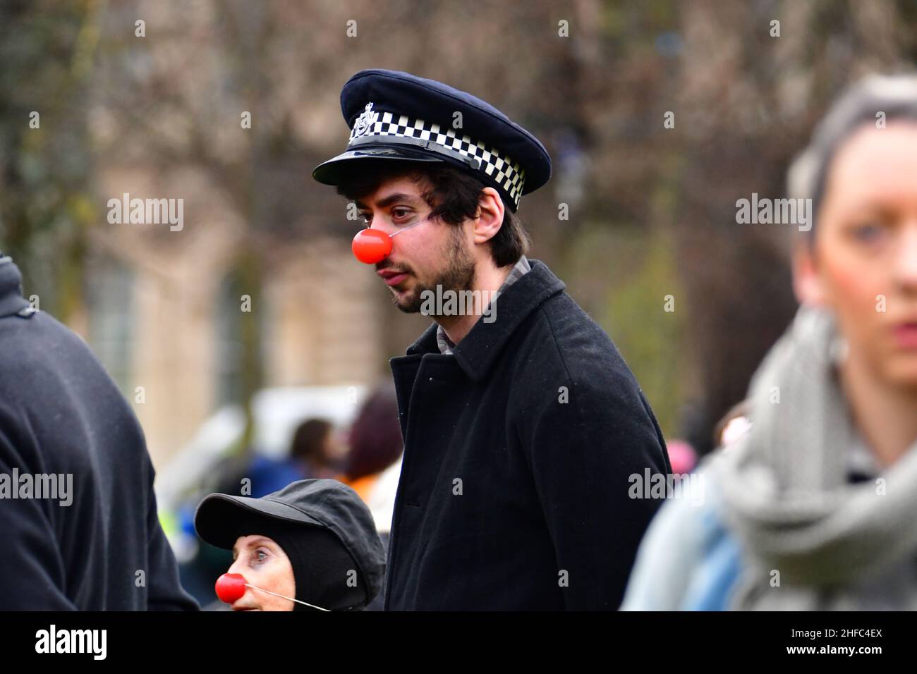 Bristol, UK. 15th Jan, 2022. On a mild afternoon activists dressed as police in fancy dress and other protesters are seen on College Green out side of City Hall, Protesting Kill the Bill and Youth Climate change. Picture Credit: Robert Timoney/Alamy Live News Stock Photo