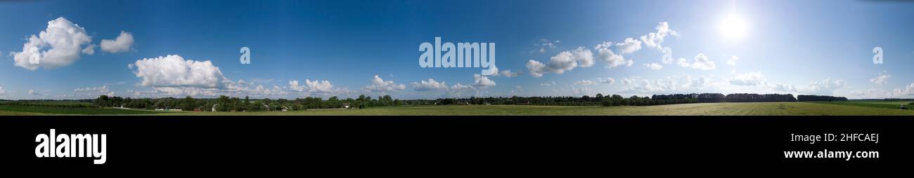 White loose clouds on a blue sky Stock Photo