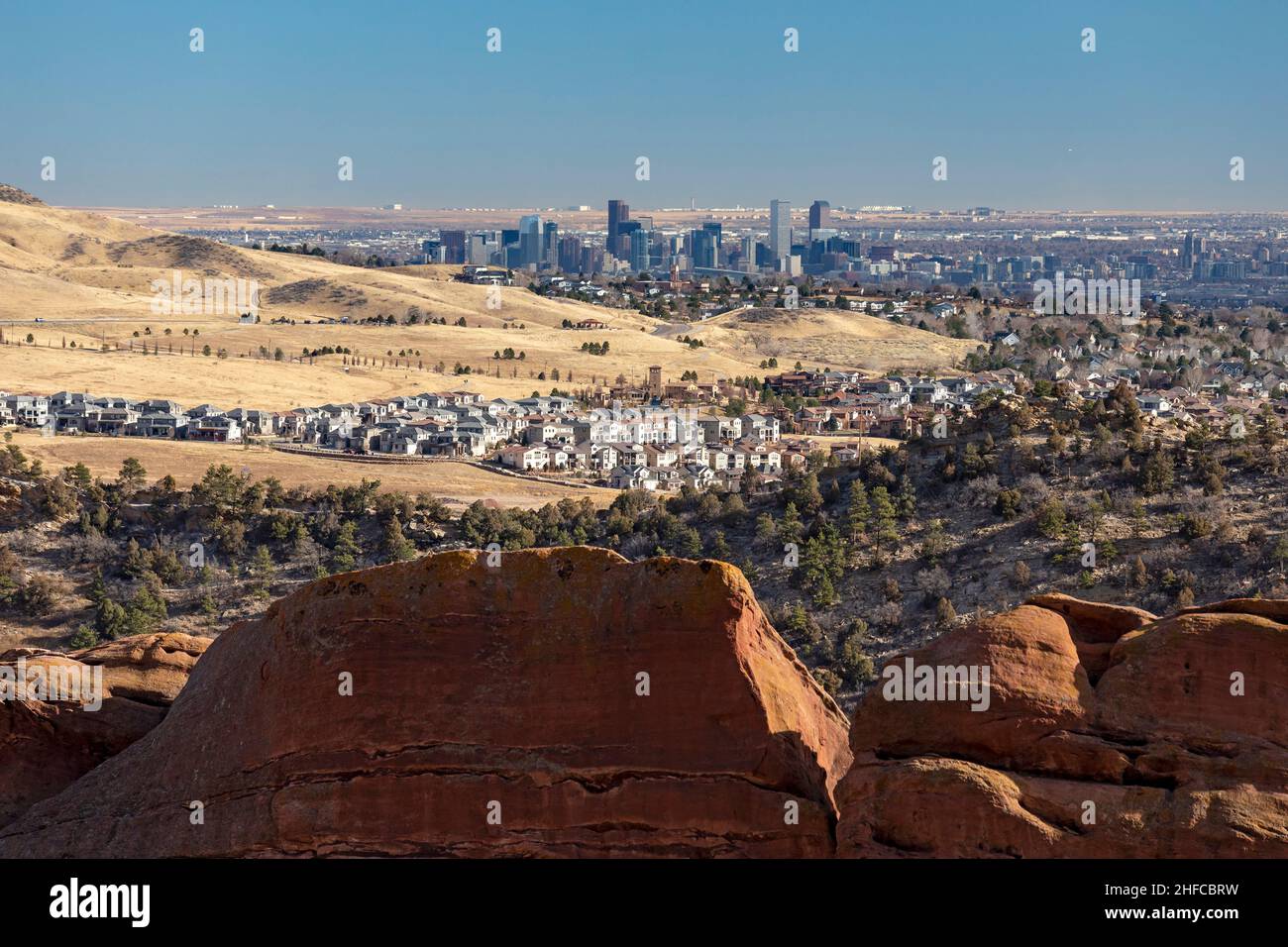 Morrison, Colorado - Downtown Denver, from Red Rocks Ampitheatre, a popular concert venue ten miles away in the Rocky Mountain foothills. Stock Photo