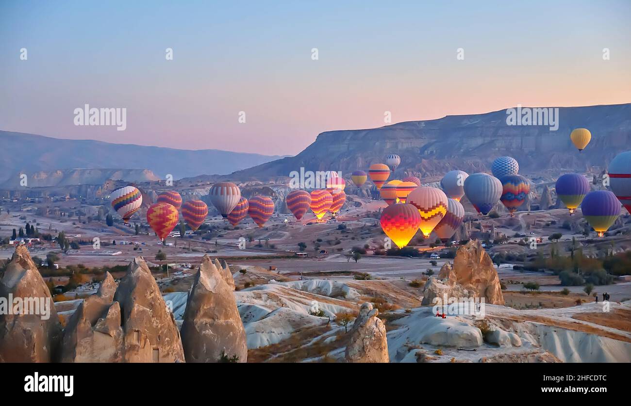 Panoramic landscape hot air balloons in Cappadocia, Turkey. Stock Photo