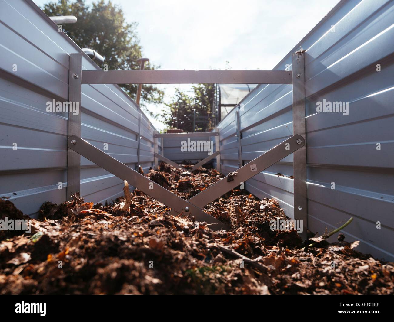 New raised bed being filled with compost and leaf mold Stock Photo Alamy