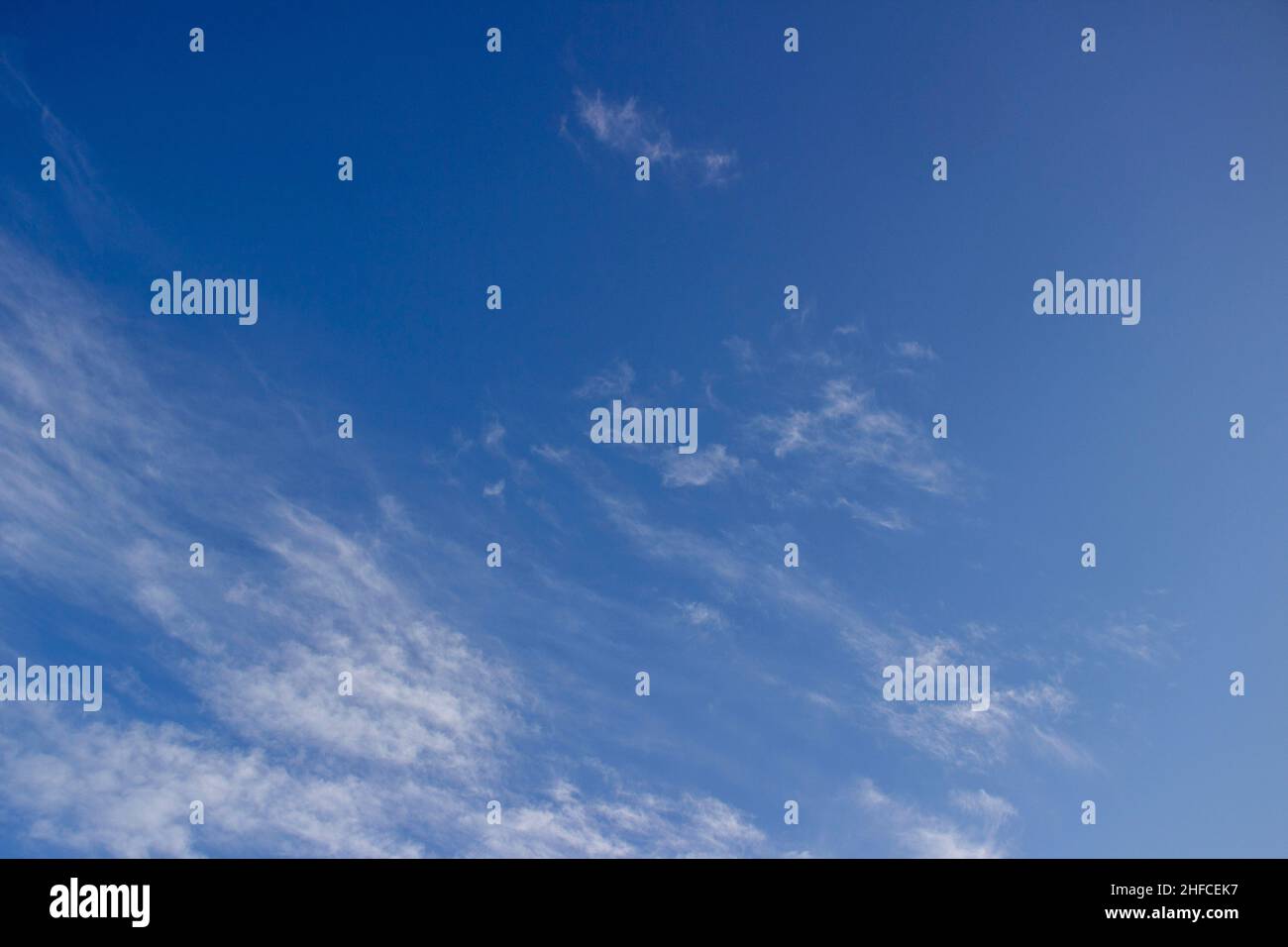 White clouds on a blue sky. Clear day. Stock Photo