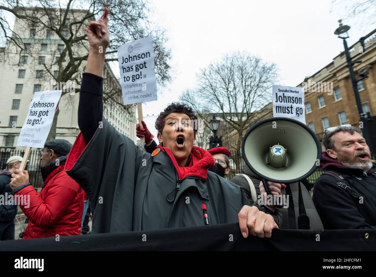 London, UK.  15 January 2022.  A woman chants anti-Boris Johnson messages outside Downing Street during a Kill the Bill protest in central London.  The protests were prompted by the Police, Crime, Sentencing and Courts Bill, which propose to give police in England and Wales more power to impose conditions on non-violent protests, including those which are deemed too noisy or a nuisance. Credit: Stephen Chung / Alamy Live News Stock Photo