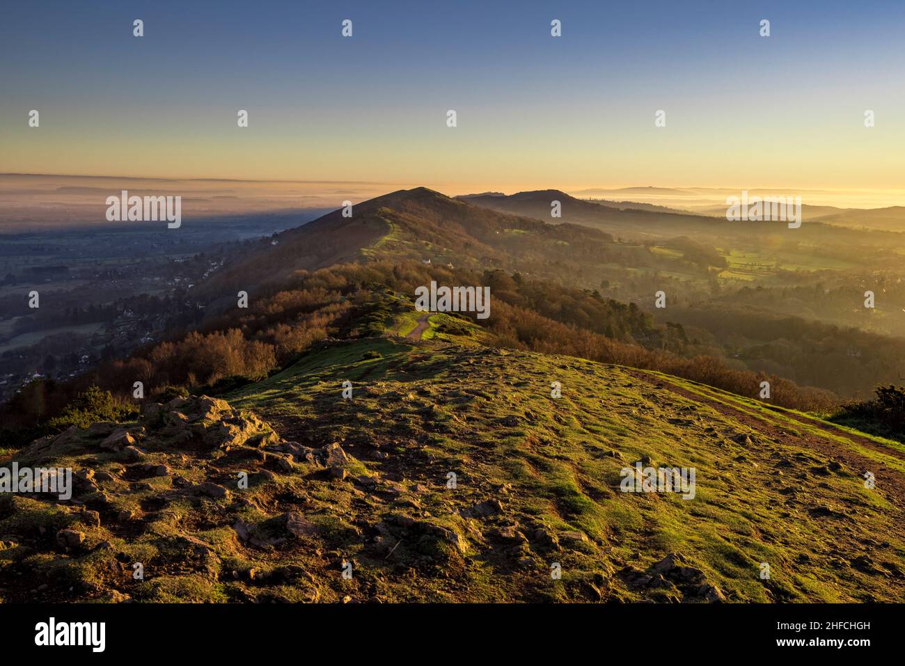 Granite rocks on Summer Hill at sunset in the winter, Malverns, England Stock Photo