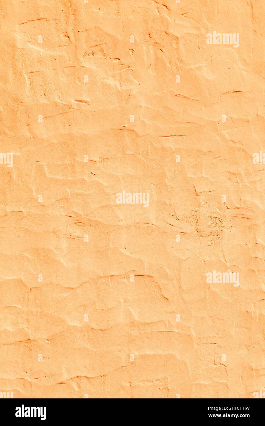 Grunge texture of orange cement wall Stock Photo - Alamy