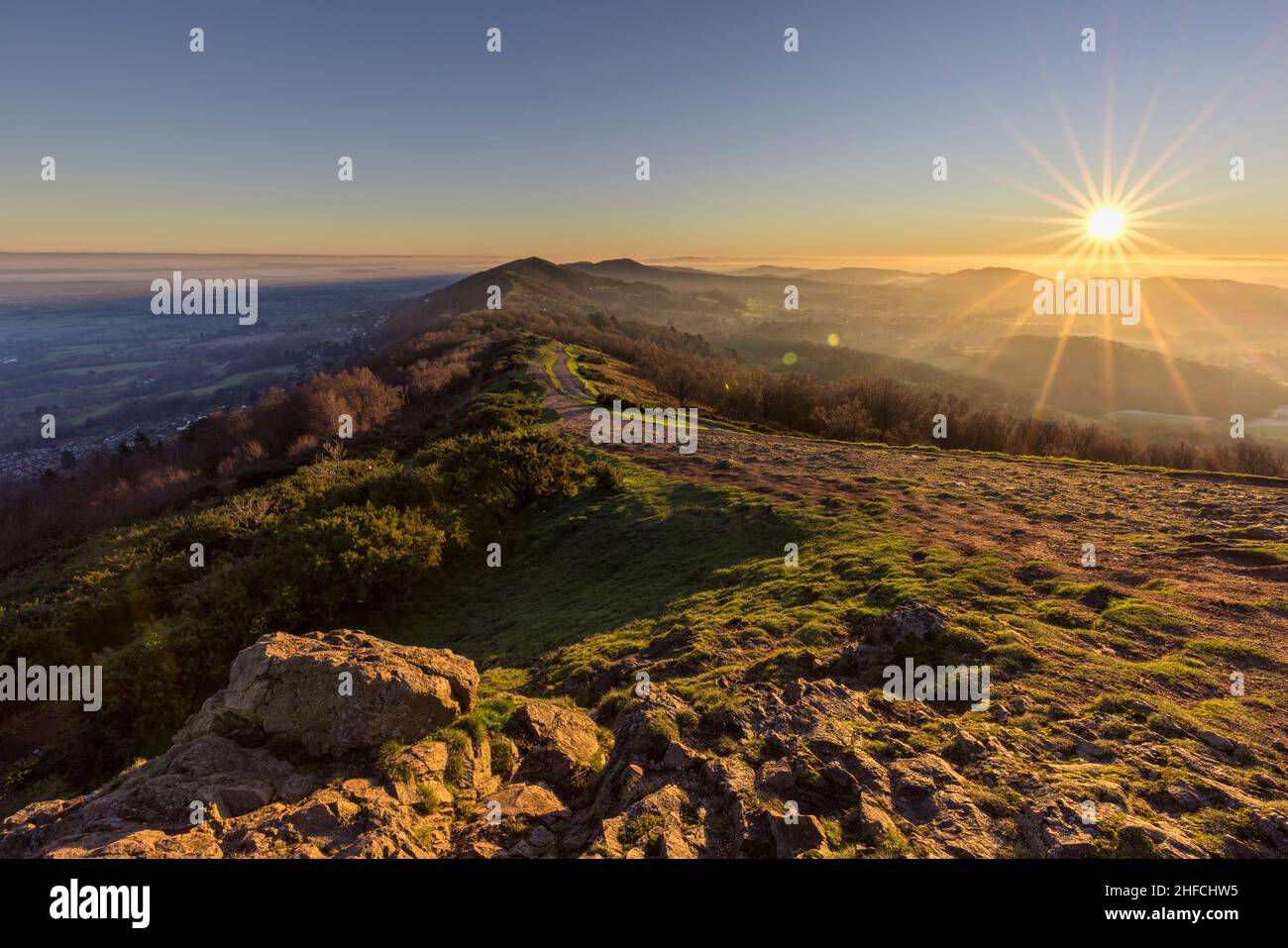 Granite rocks on Summer Hill at sunset in the winter, Malverns, England Stock Photo