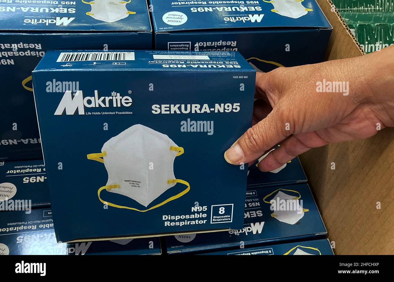 Orlando, United States. 14th Jan, 2022. N95 face masks are seen on display at a Home Depot store in Orlando on the day that the Centers for Disease Control and Prevention (CDC) updated its guidance on masks for the general public. The CDC now says that people 'may choose' to wear N95 and KN95 masks because they offer the best protection against Covid-19. Further, the CDC recommends that people wear the most protective mask that fits well and will be worn consistently. (Photo by Paul Hennessy/SOPA Images/Sipa USA) Credit: Sipa USA/Alamy Live News Stock Photo