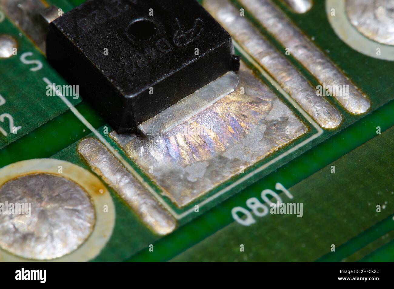 Crystallized metal solder on printed circuit board (PCB Stock Photo Alamy