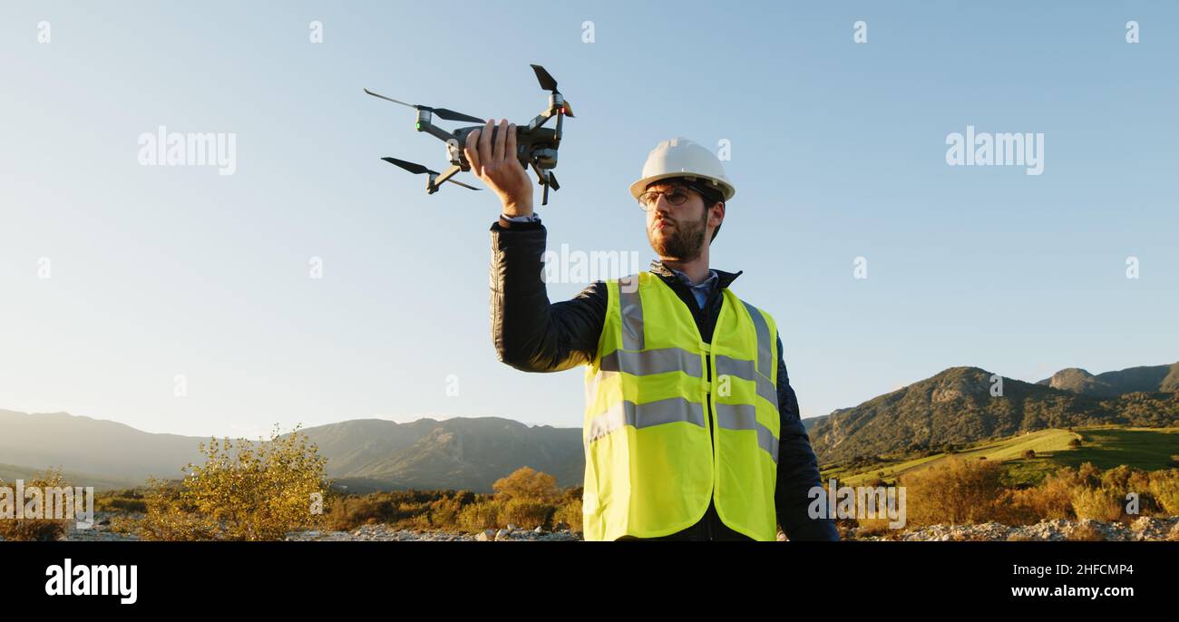 engineer with drone check the state of the environment and the ...