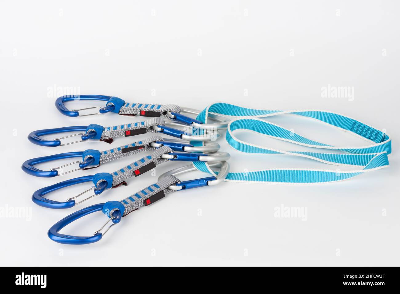 Five quick draws on sewn loop sling. Upper carabiner with straight gate