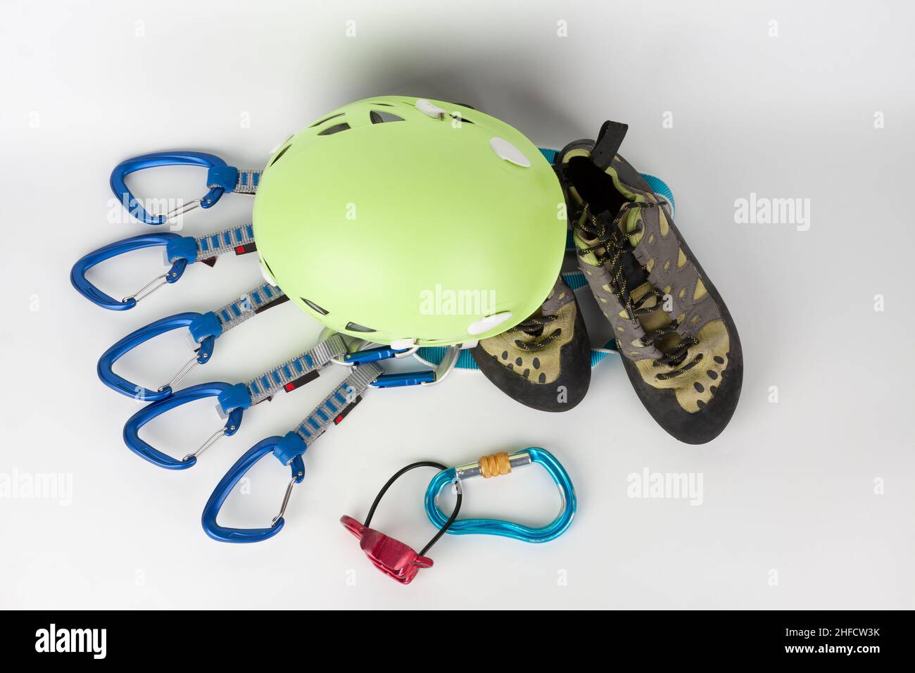 Five quick draws on sewn loop sling, belay device, climbing footwear ...