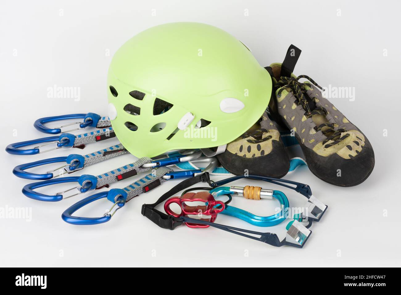 Five quick draws on sewn loop sling, belay device, climbing footwear