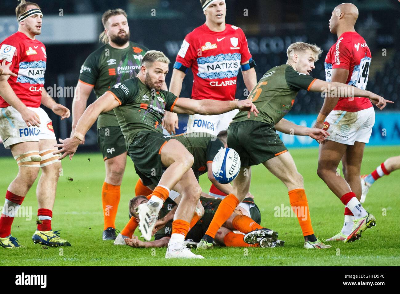 Swansea, UK. 15 January, 2022. Ospreys scrum half Rhys Webb kicks the ball during the Ospreys v Racing 92 EPCR Champions Cup Rugby Match. Credit: Gruffydd Thomas/Alamy Stock Photo