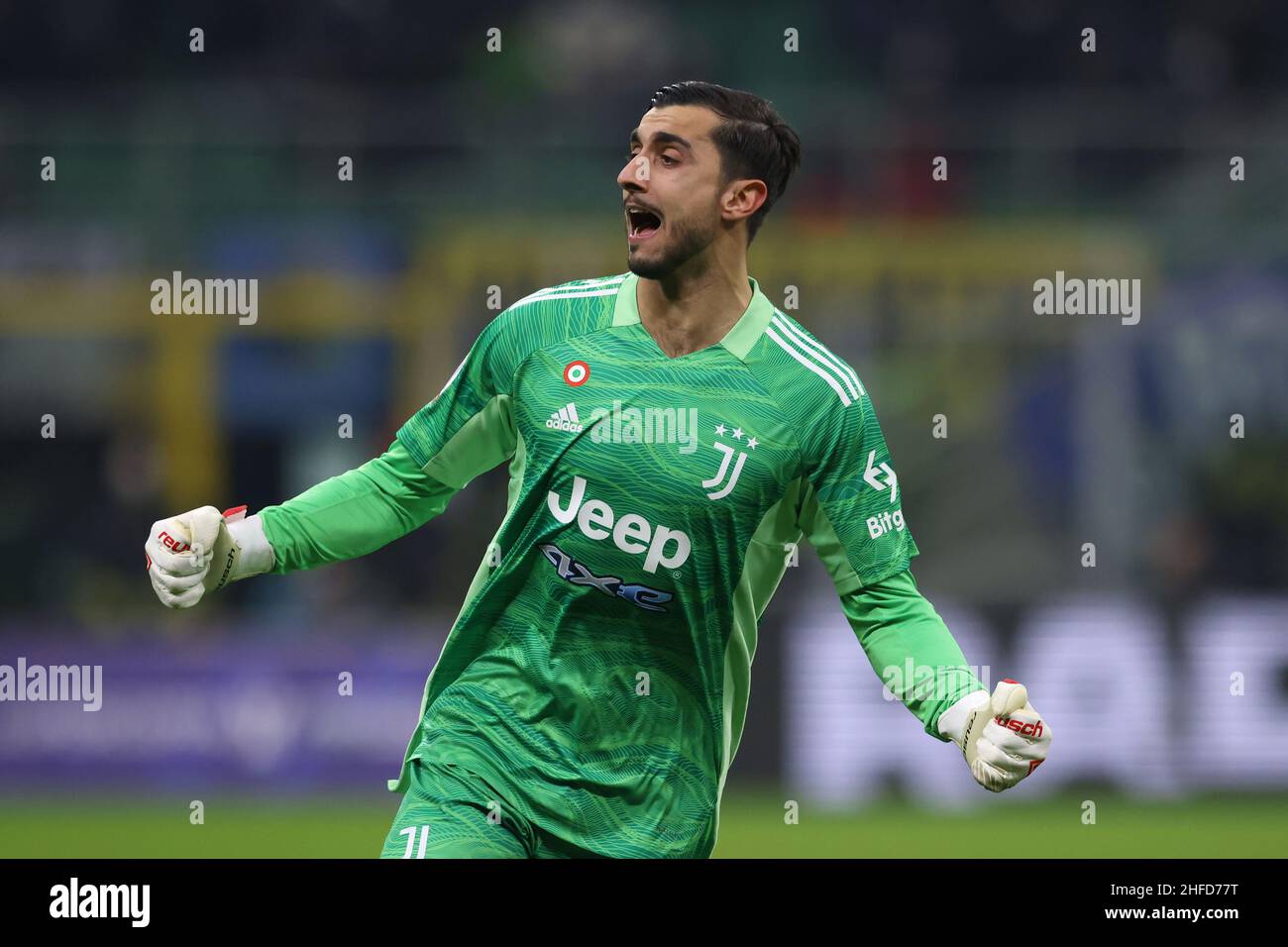 Milan, Italy, 12th January 2022. Mattia Perin of Juventus celebrates after  team mate Weston McKennie scored to give the side a 1-0 lead during the  Supercoppa Frecciarossa match at Giuseppe Meazza, Milan.