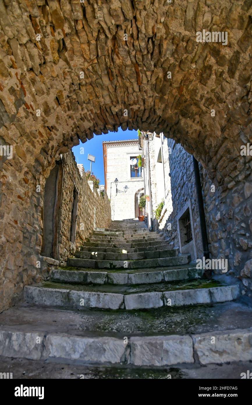 A street among the characteristic houses of Buonalbergo, a mountain village in the province of Benevento, Italy. Stock Photo