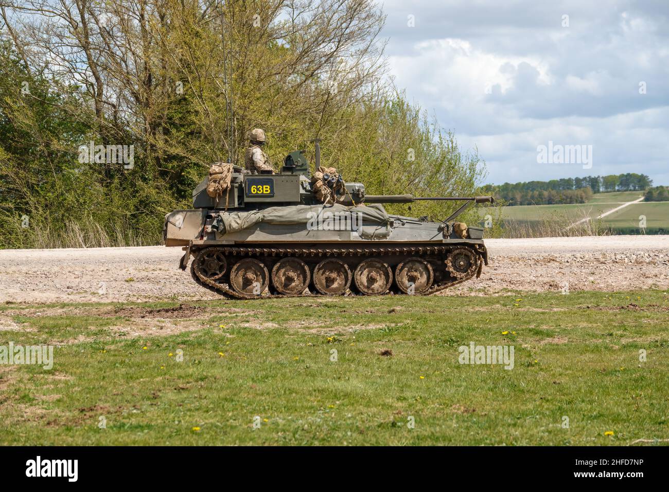 british army FV107 Scimitar armoured tracked military reconnaissance vehicle in action on a military exercise Wiltshire UK Stock Photo