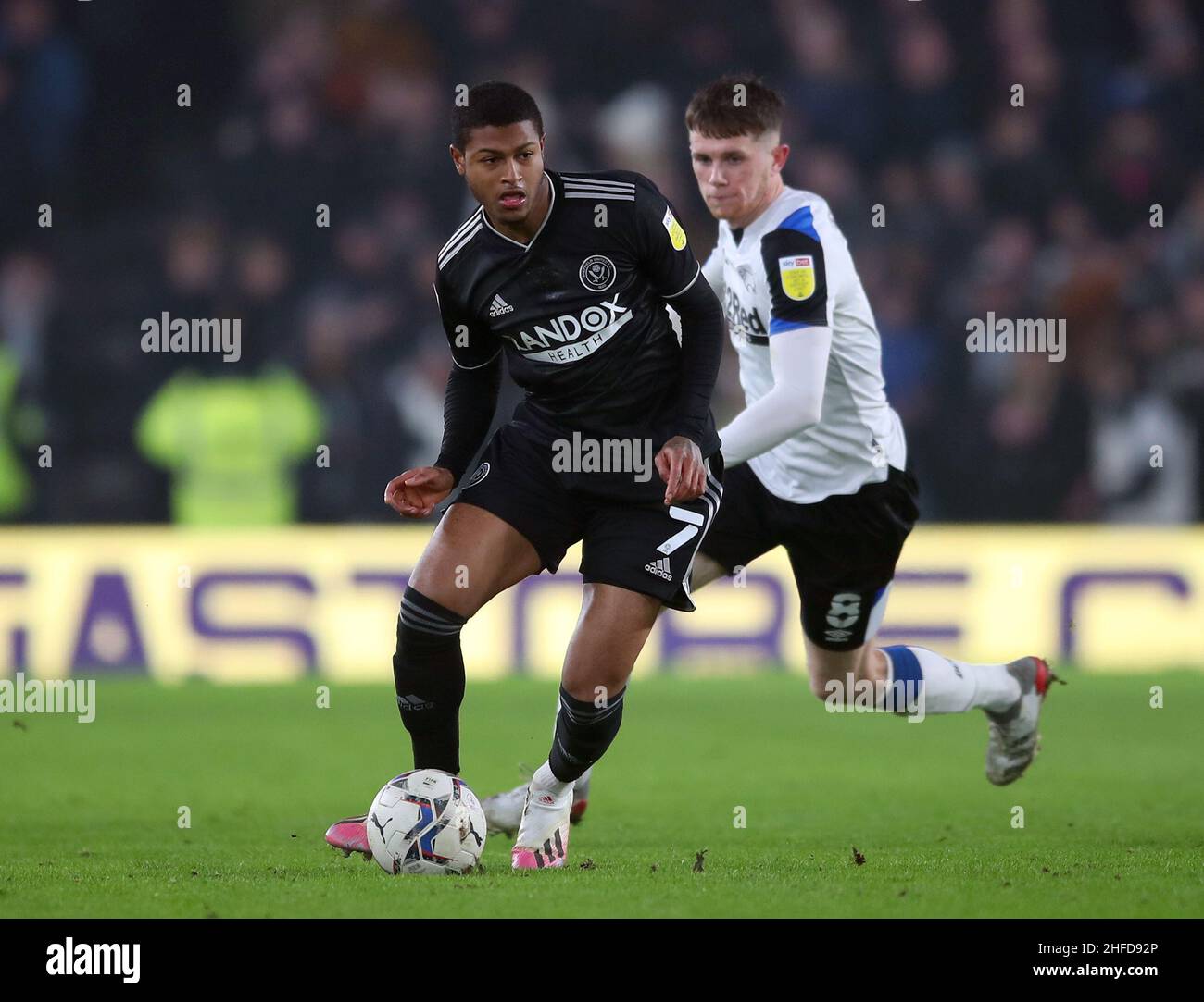 Derby, England, 15th January 2022.   Rhian Brewster of Sheffield Utd and Max Bird of Derby County during the Sky Bet Championship match at Pride Park Stadium, Derby. Picture credit should read: Simon Bellis / Sportimage Stock Photo