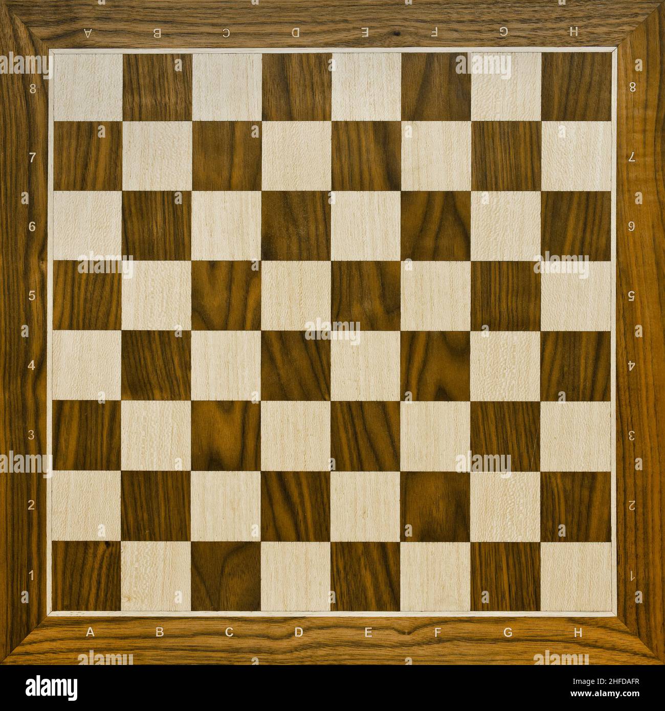 Premium Photo  Wooden chessboard with figures in light and dark brown  tones isolate on a white background