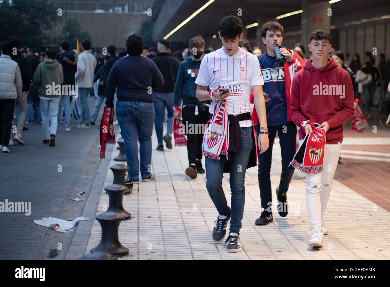 Seville, Spain. 15th Jan, 2022. Football supporters of Sevilla FC wearing fan gear seen outside the Sevilla FC hotel before the Copa del Rey football derby against Real Betis in Seville. (Photo credit: Mario Diaz Rasero Credit: Gonzales Photo/Alamy Live News Stock Photo