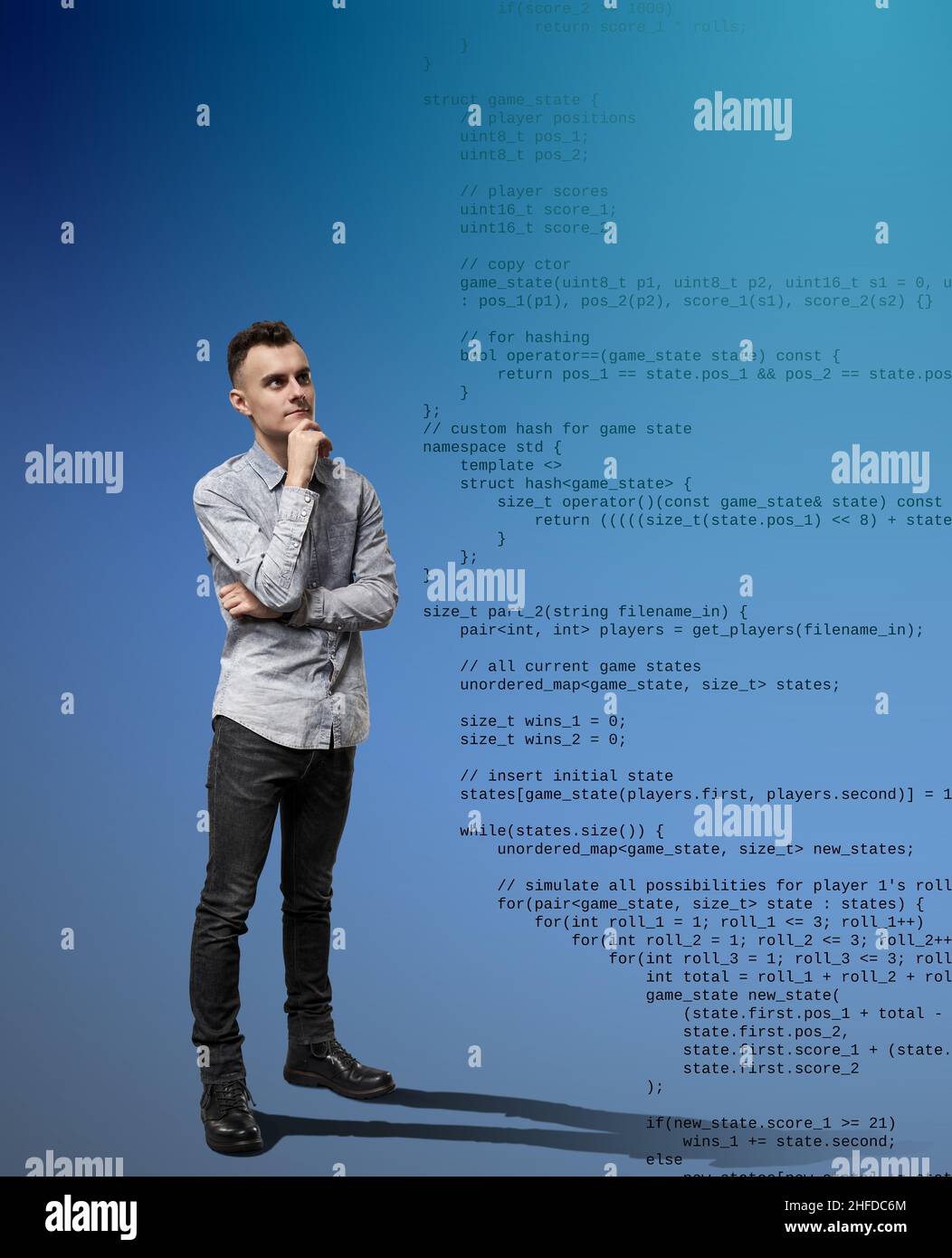 Software developer with hand on chin examining code flowing by the side of the image Stock Photo