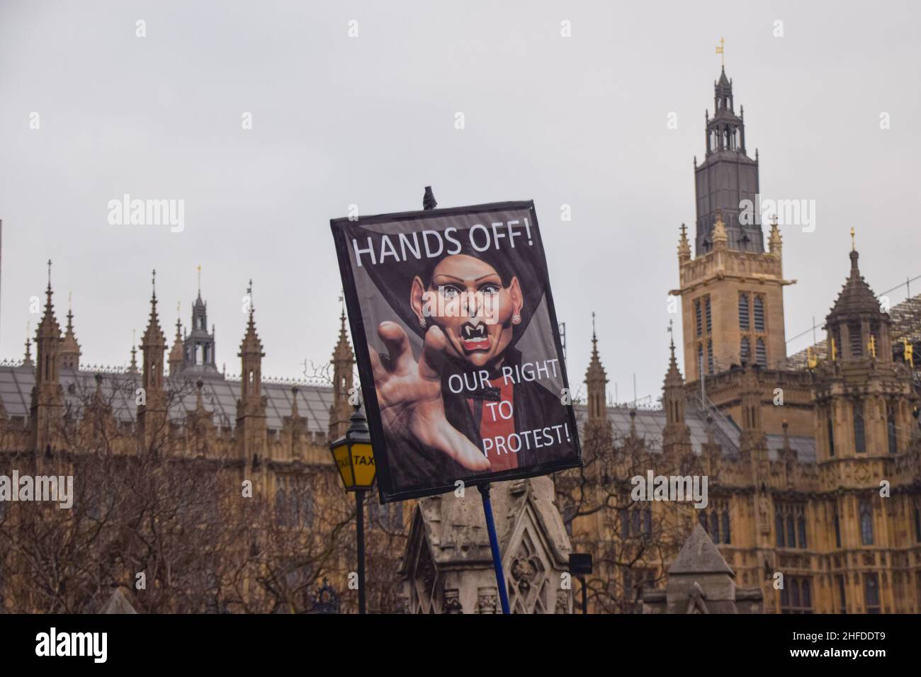 London, UK 15th January 2022. A protester holds an anti-Priti Patel placard in Parliament Square during the Kill The Bill protest. Thousands of people marched through central London in protest against the Police, Crime, Sentencing and Courts Bill, which will make many types of protest illegal. Credit: Vuk Valcic / Alamy Live News Stock Photo
