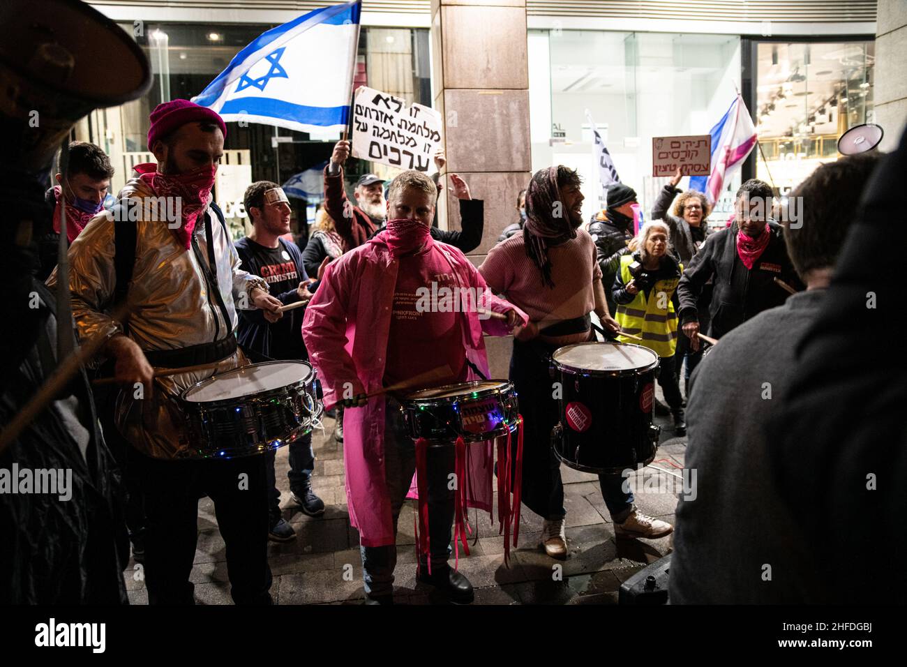 Hundreds of Israeli Anti-Netanyahu protestors demonstrate in Petah Tikva against an upcoming plea bargain deal in his trial case. Netanyahu stands on trial for fraud, bribe and breach of trust in three different cases. 16th Jan 2022.(Matan Golan/Alamy Live News) Stock Photo