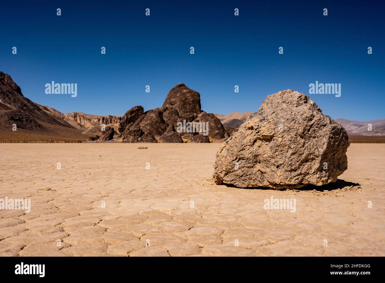 Large Rock on the Racetrack Playa in front of the grandstand Stock Photo