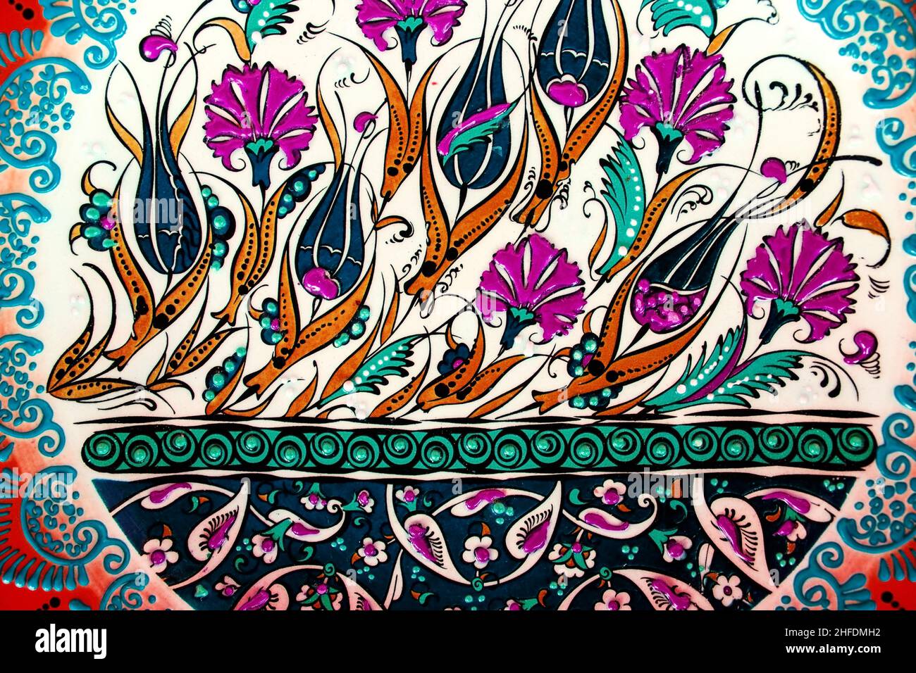 Traditional ottoman patterns on the porcelain surface. Traditional Turkish tile art called cini. Çini patterns. Çini art. Ottoman floral motifs. Stock Photo