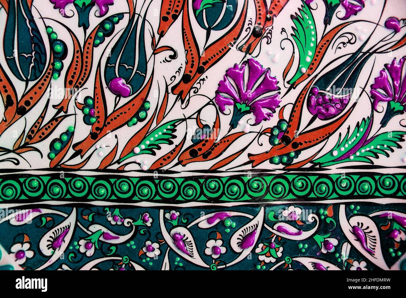 Traditional ottoman patterns on the porcelain surface. Traditional Turkish tile art called cini. Çini patterns. Çini art. Ottoman floral motifs. Stock Photo