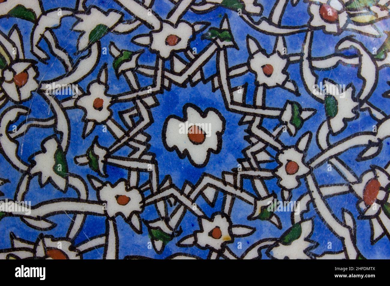 Traditional ottoman patterns on the porcelain surface. Traditional Turkish tile art called cini. Çini patterns. Çini art. Ottoman floral motifs. Stock Photo