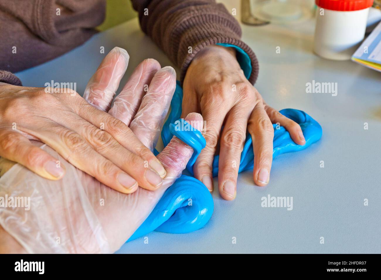 hand physiotherapy to recover a broken finger Stock Photo - Alamy