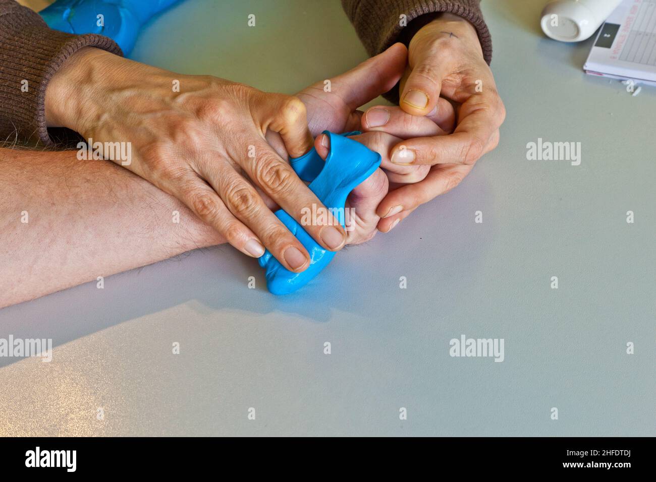 hand physiotherapy to recover a broken finger Stock Photo Alamy