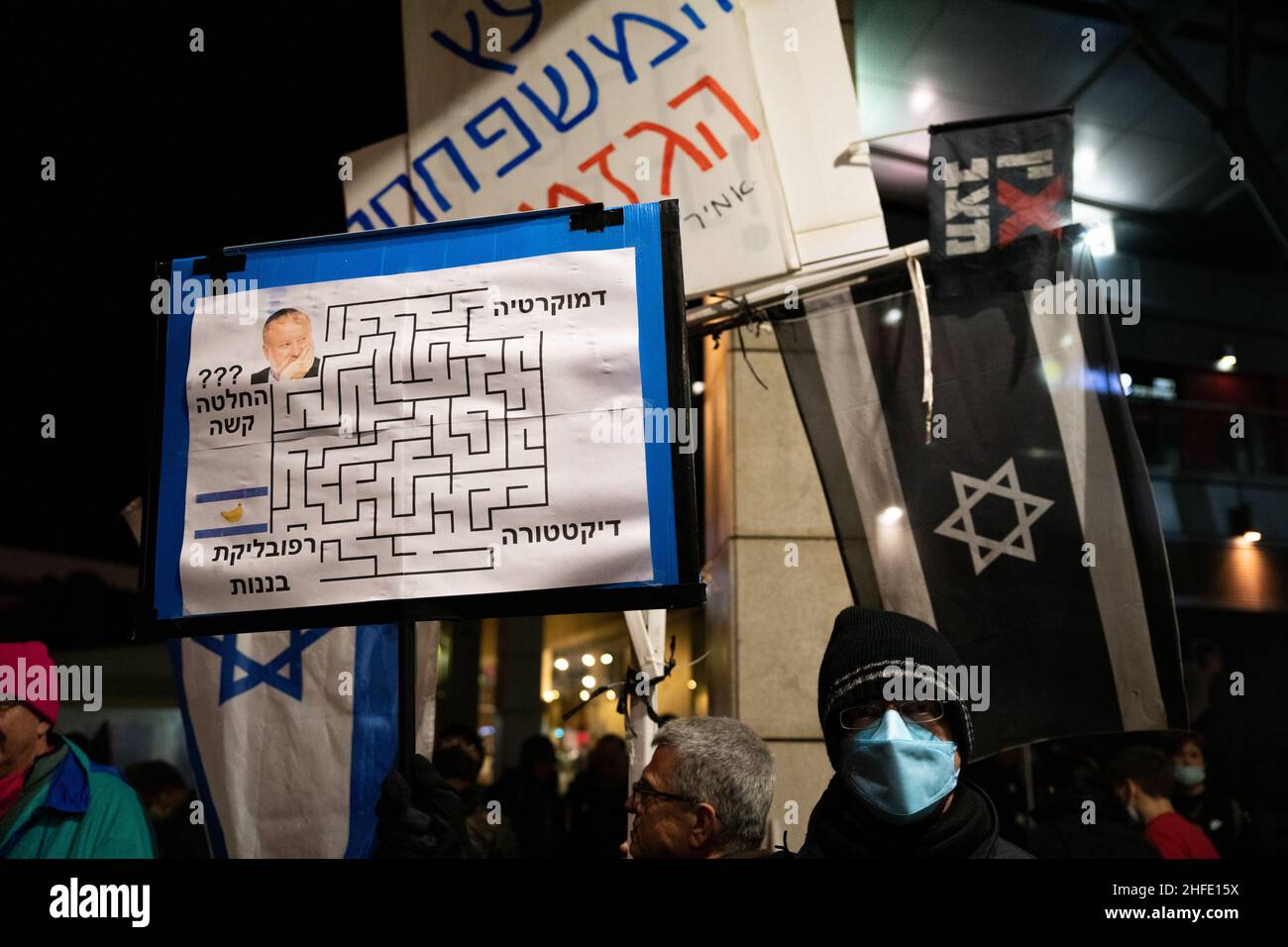 Israel. 15th Jan, 2022. Hundreds of Israeli Anti-Netanyahu protestors demonstrate in Petah Tikva against an upcoming plea bargain deal in his trial case. Netanyahu stands on trial for fraud, bribe and breach of trust in three different cases. 15th Jan 2022.(Photo by Matan Golan/Sipa USA) Credit: Sipa USA/Alamy Live News Stock Photo