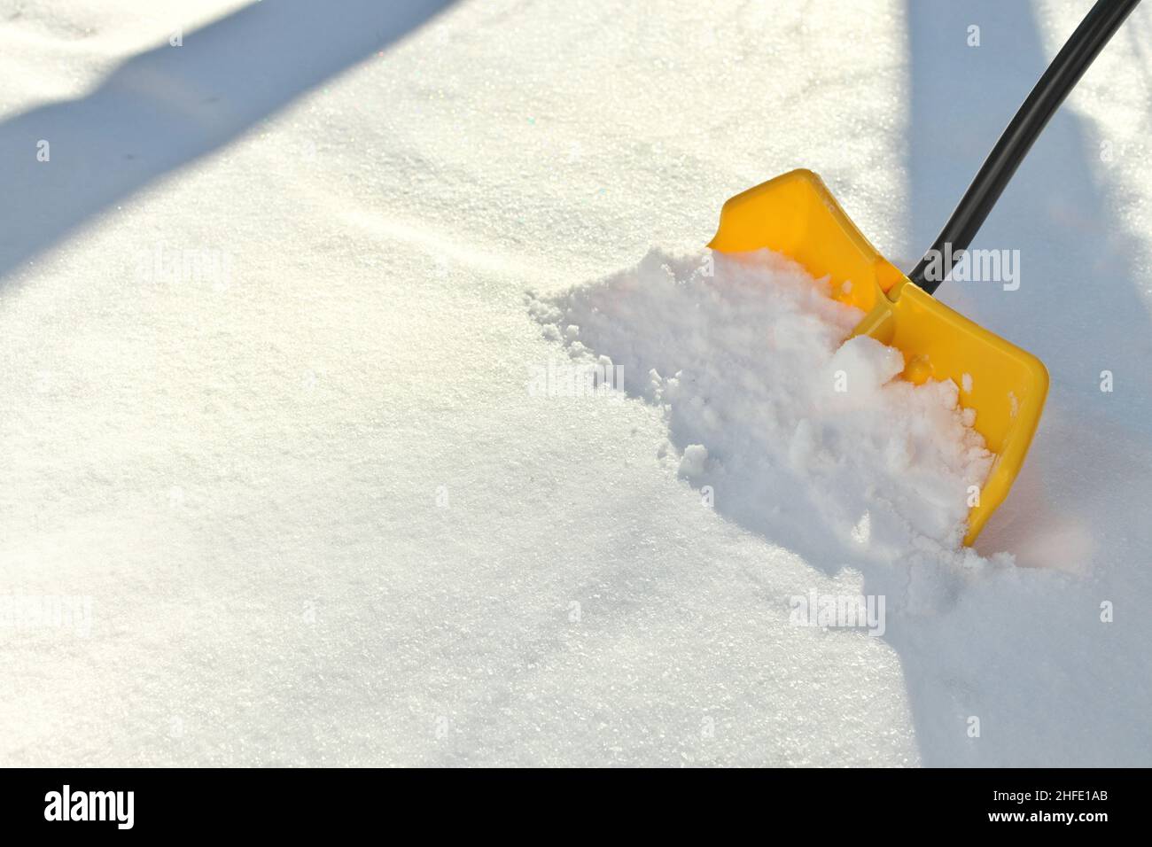 Yellow Snow Shovel Shoveling Fresh, Deep Powdery Snow Stock Photo Alamy