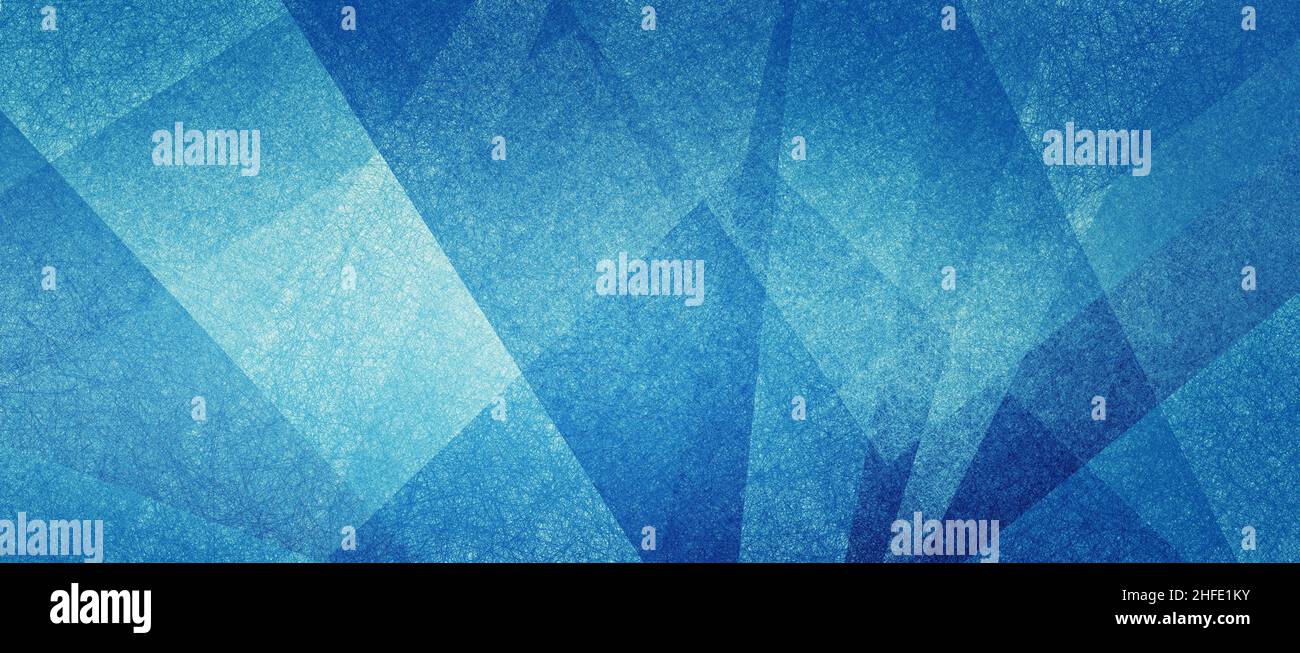 Abstract modern background in blue and white contemporary triangle and polygonal shapes layered in textured geometric art pattern with angles Stock Photo