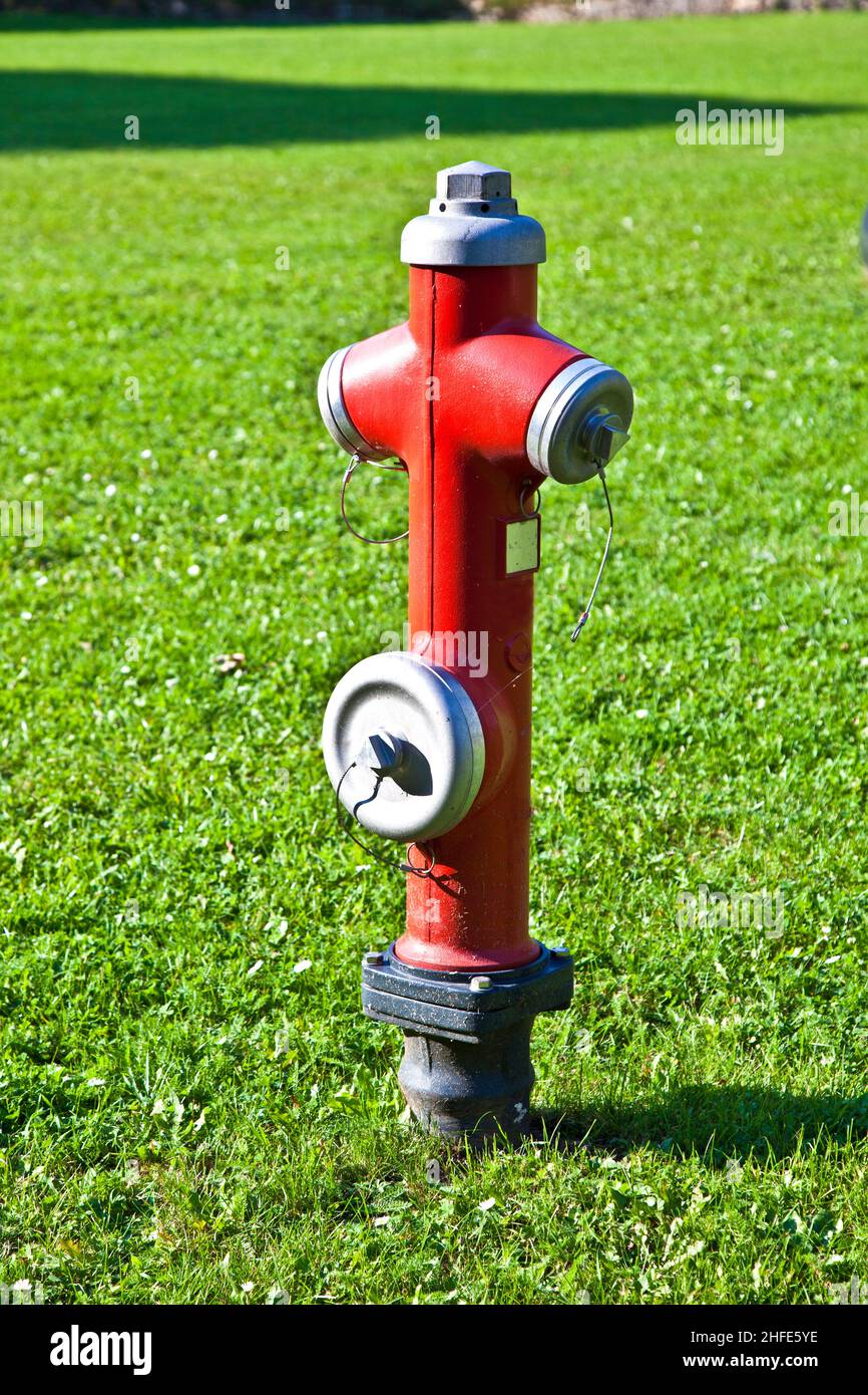 red hydrant at the meadow Stock Photo Alamy