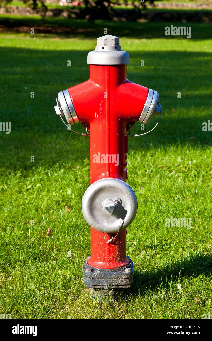 red hydrant at the meadow Stock Photo Alamy
