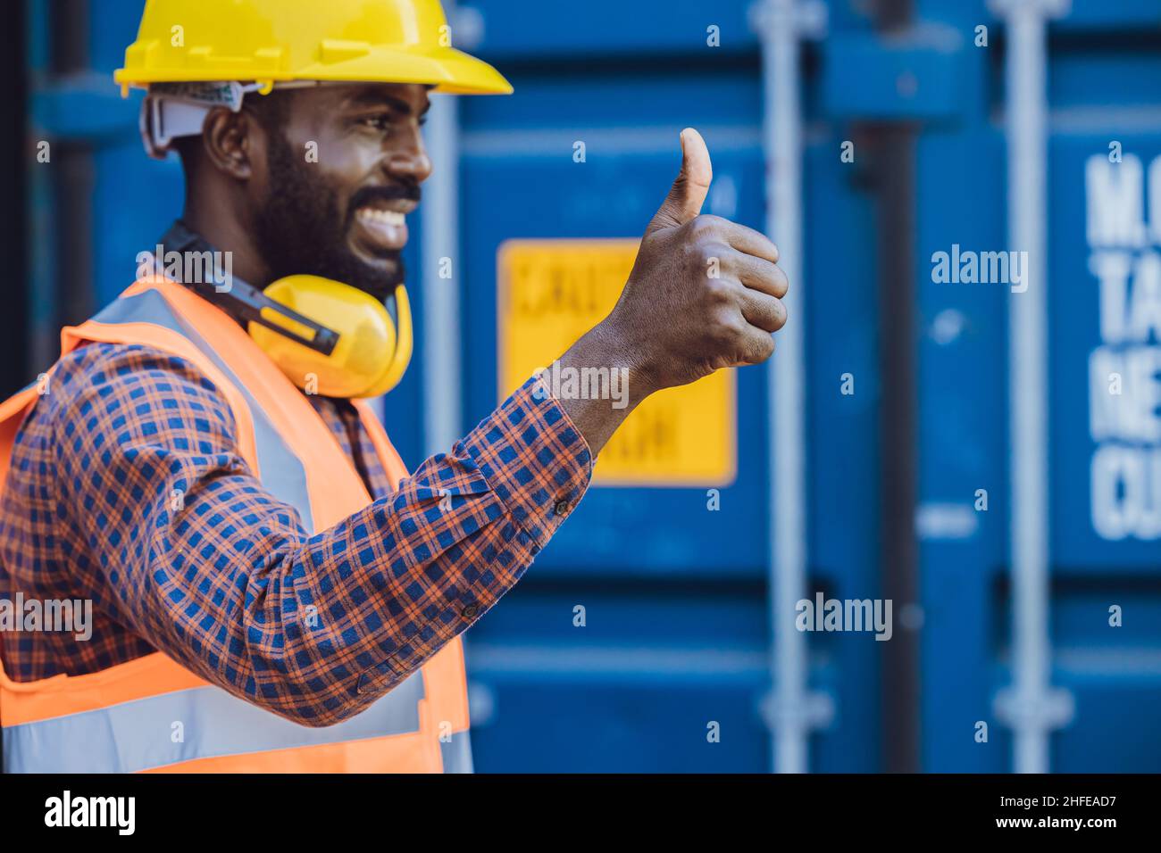 worker thumbs up hand sign good job best working approved, selective focus at hand Stock Photo