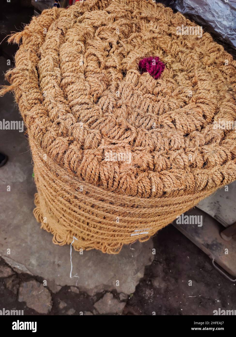 closeup photo of bundle of rope made of coconut husk fibre. kept for sale. Stock Photo