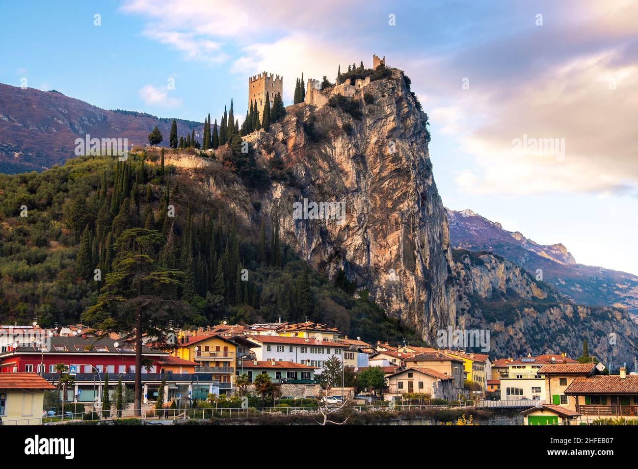 Arco city with castle on rocky cliff in Trentino Alto adige - province of Trento - Italy landmarks Stock Photo