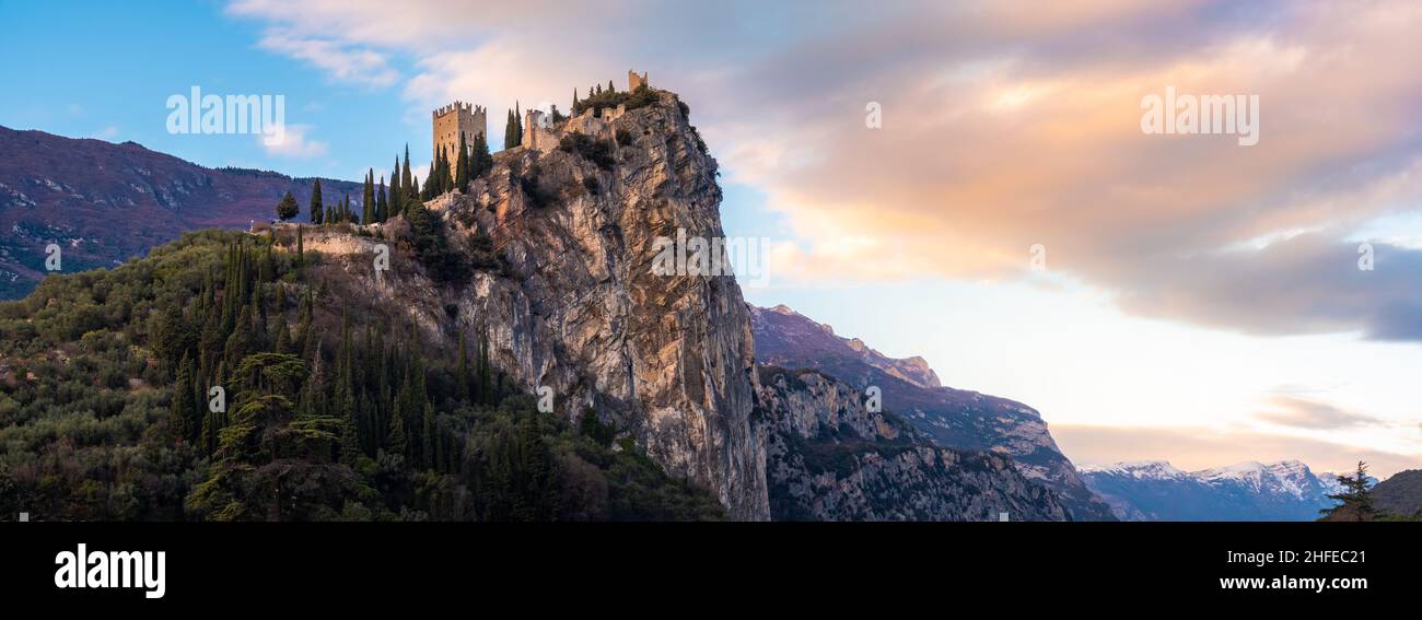 Arco castle on rocky cliff horizontal background of Trentino Alto adige - Trento - Italy landmarks Stock Photo